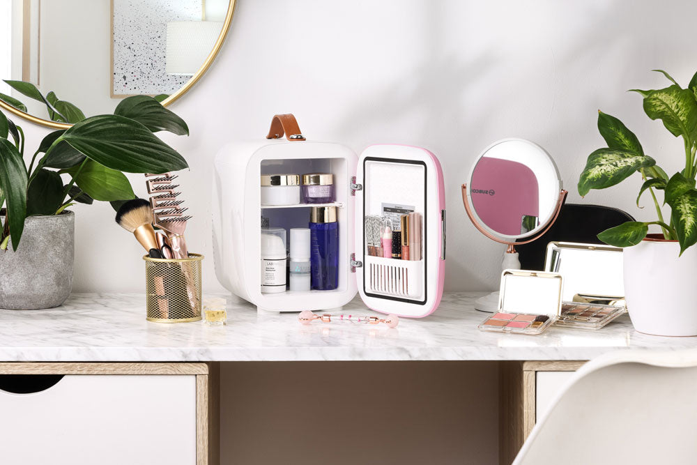 Subcold Pro 4 litre pink skincare fridge with cosmetics, beauty and makeup products