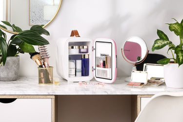 Subcold Pro 4 litre pink skincare fridge with cosmetics, beauty and makeup products