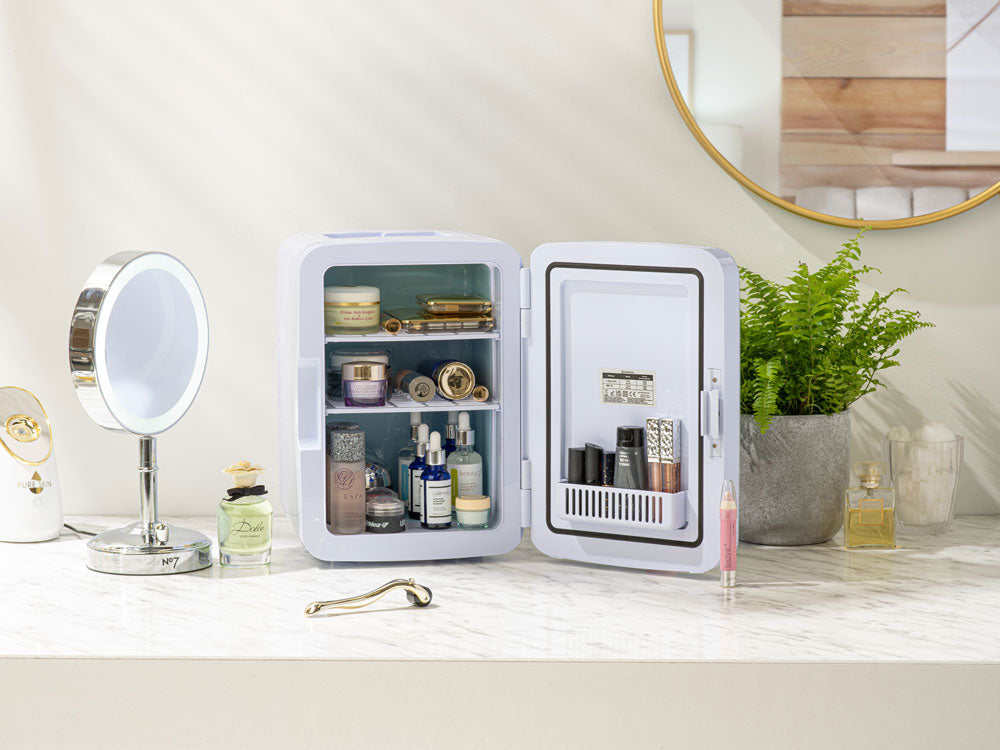Subcold Ultra 10 litre white skincare fridge with makeup and cosmetics inside