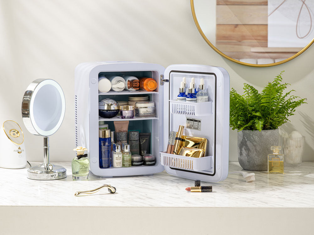 Subcold Ultra white 15L skincare fridge with makeup and cosmetics inside