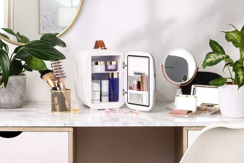 Subcold Pro 4 litre grey skincare fridge with cosmetics, beauty and makeup products