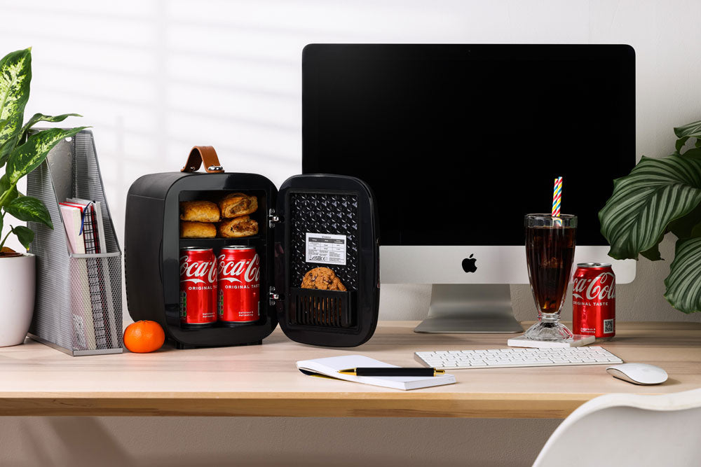 Subcold Pro 4 litre black mini fridge with snacks and drinks inside