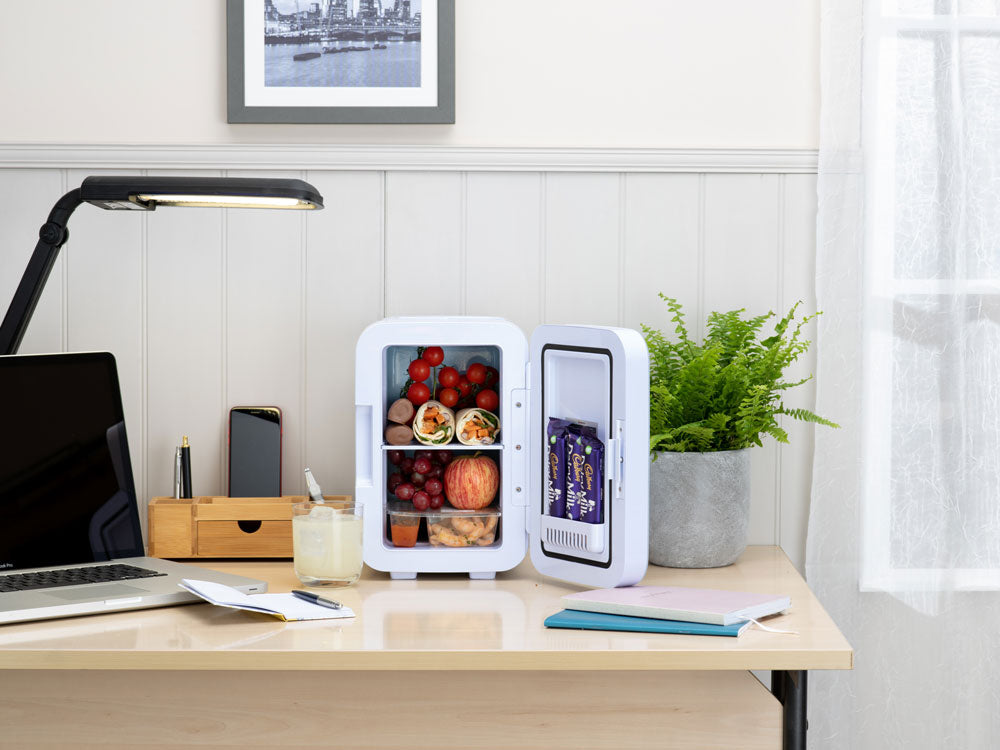 Subcold Ultra 6 litre white mini fridge with cold drinks and snacks inside