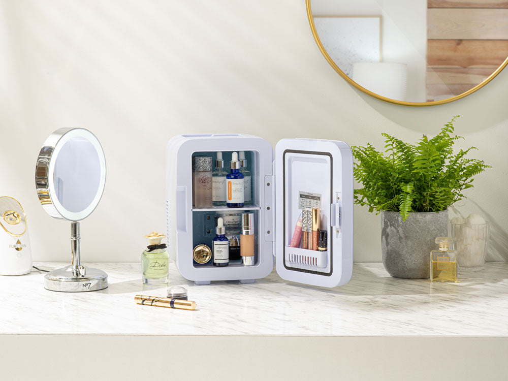 Subcold Ultra pink 6L skincare fridge with makeup and cosmetics inside